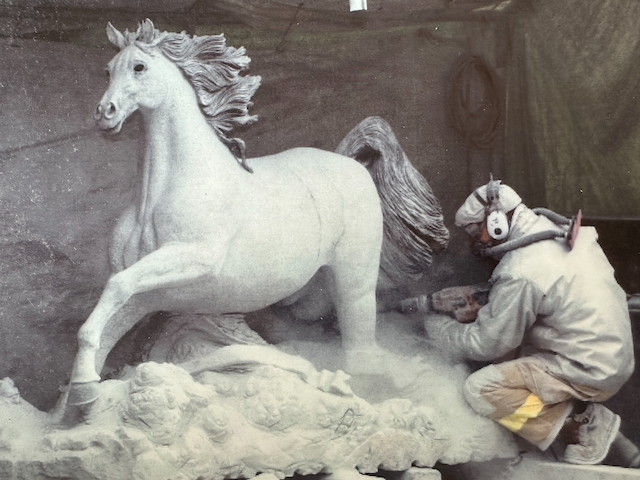 Stephen H. Dean works on a granite Stallion at the Movin Free Ranch in Fairbanks, Alaska.